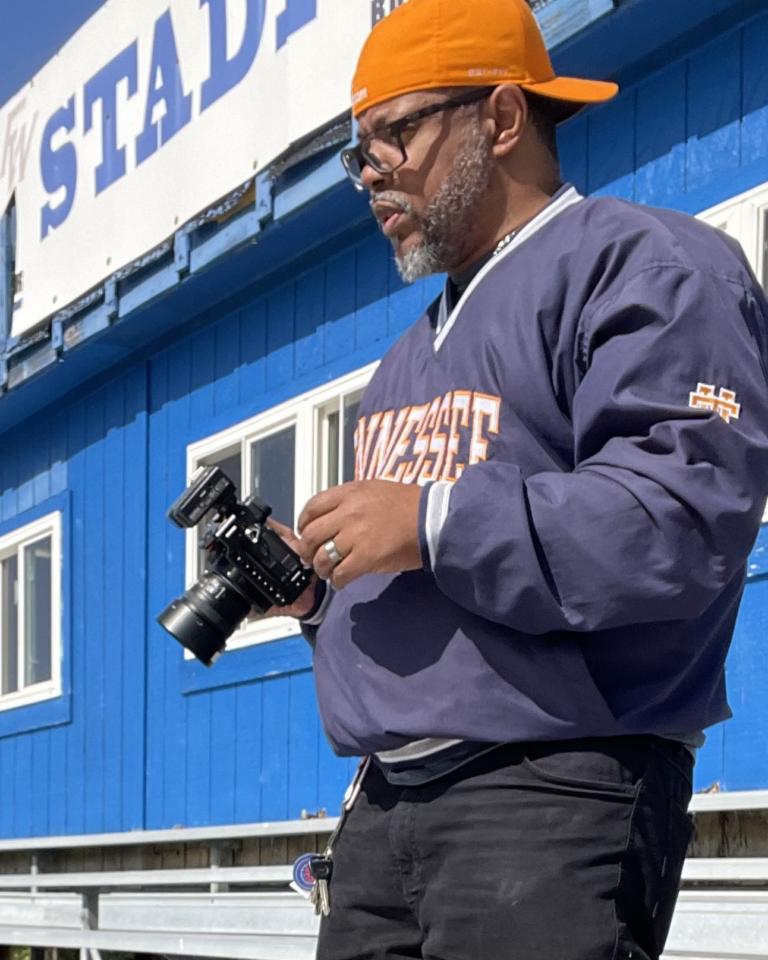 K. A. Jefferson on a photo shoot at Fayette-Ware High School football field.