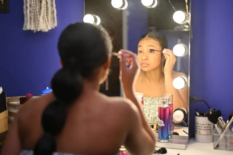 Photography Packages & Pricing Colorized version of Maddox preparing for Fayette-Ware High School prom.